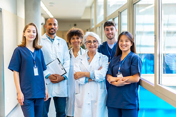 Friendly IDOC clinic staff standing together in the hospital corridor